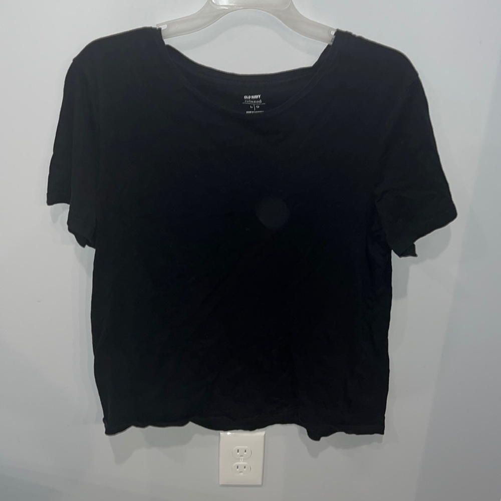 Casual black tee. Can be dressed up or dressed down. It is in good condition.